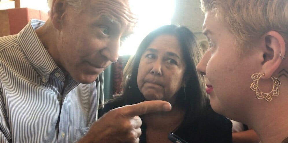 biden pointtingin womans face
