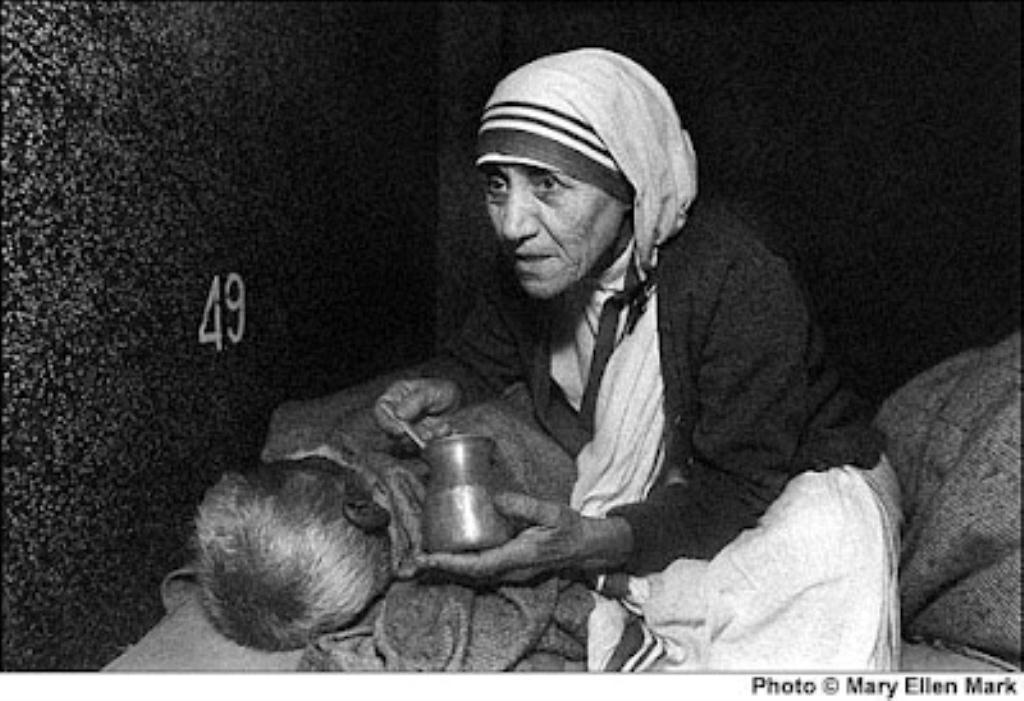 mother teresa feeding dying man sm print