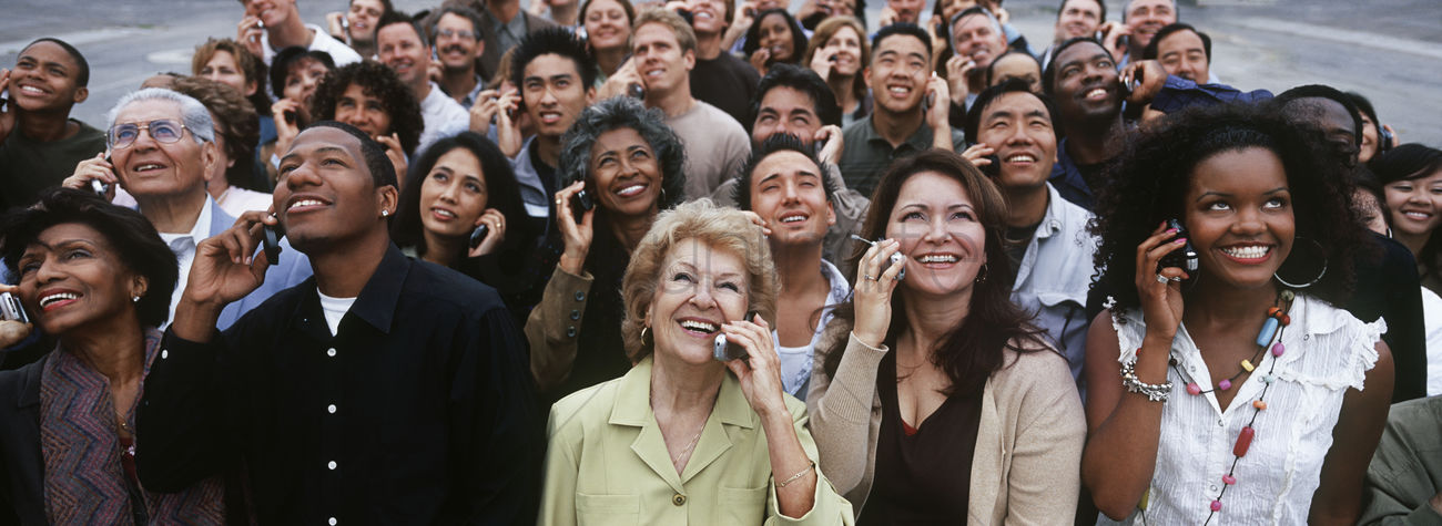 crowd-of-people-using-mobile-phones-outdoors_1905566